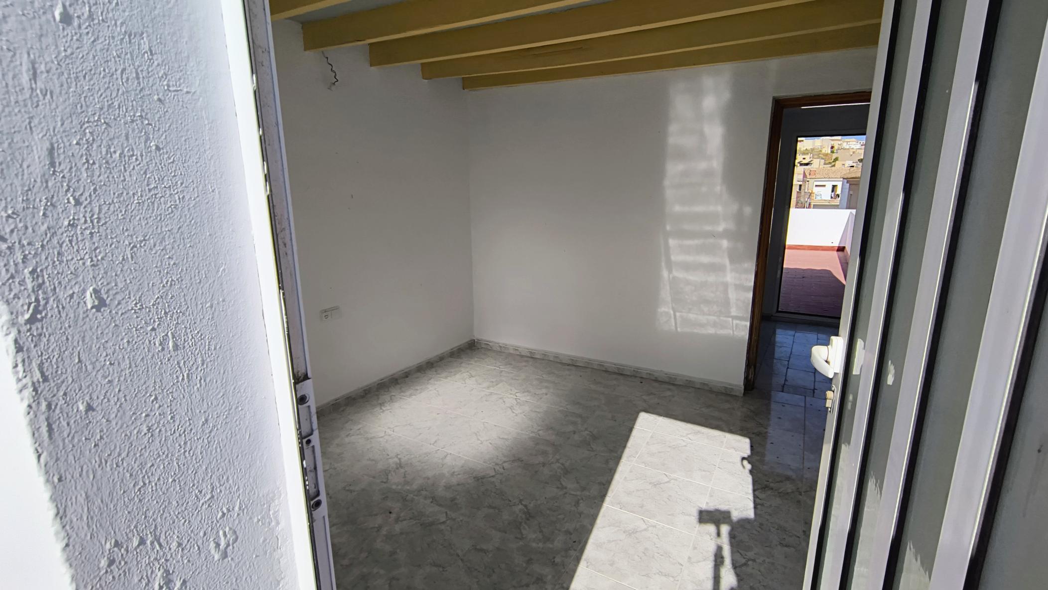 m2199-Townhouse is the centre of Turre with huge garage.